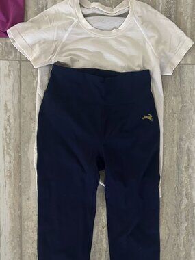 Lululemon running top and Tracksmith leggings